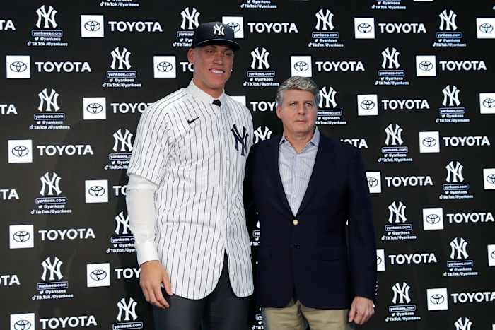 Aaron Judge poses with Yankees owner Hal Steinbrenner during a press conference after being named team captain at Yankee Stadium.